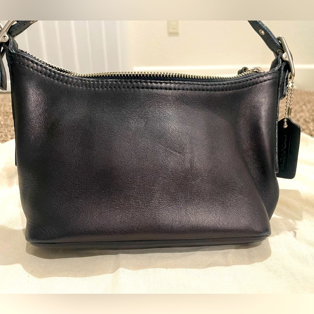 Small shoulder coach purse , excellent condition,